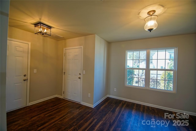 foyer entrance with dark wood-type flooring