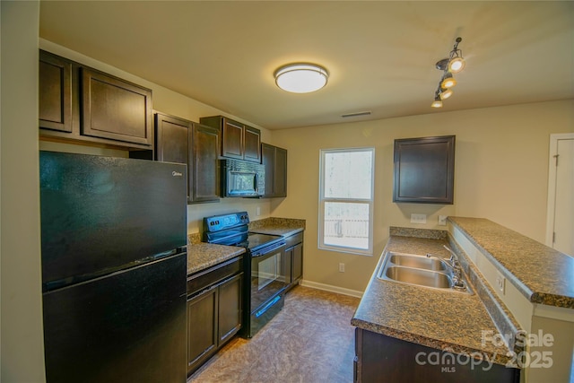 kitchen with sink, kitchen peninsula, dark brown cabinetry, and black appliances