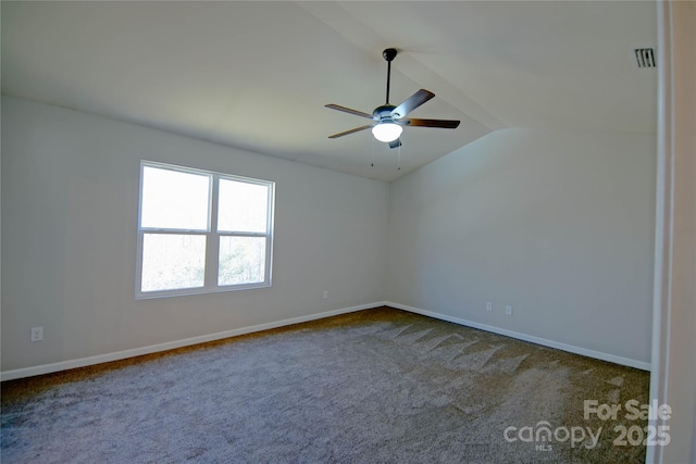 unfurnished room with lofted ceiling, carpet floors, and ceiling fan