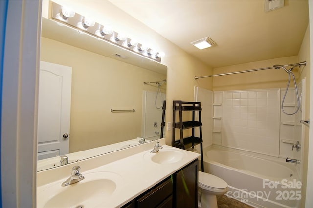 full bathroom with shower / washtub combination, vanity, and toilet