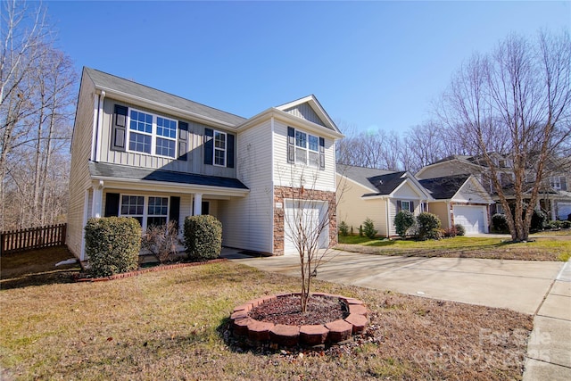 front of property featuring a garage and a front yard