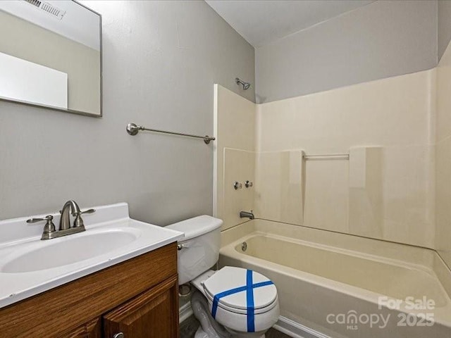 full bathroom with vanity, shower / tub combination, and toilet