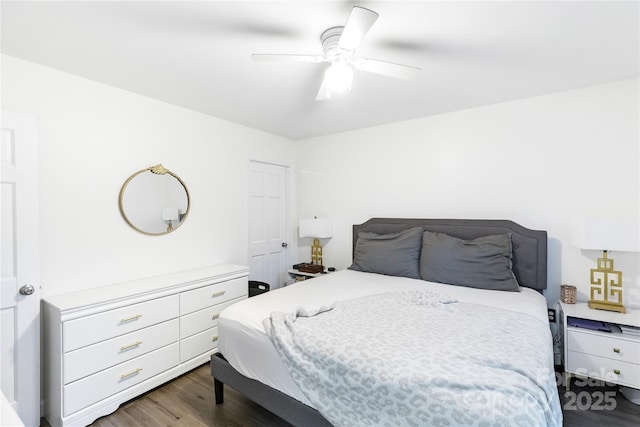 bedroom featuring dark wood-type flooring and ceiling fan