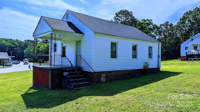 exterior space featuring a lawn