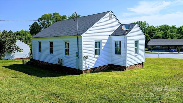 view of property exterior with a lawn