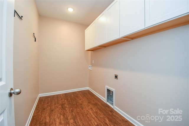 laundry area with washer hookup, dark wood-type flooring, cabinets, and hookup for an electric dryer