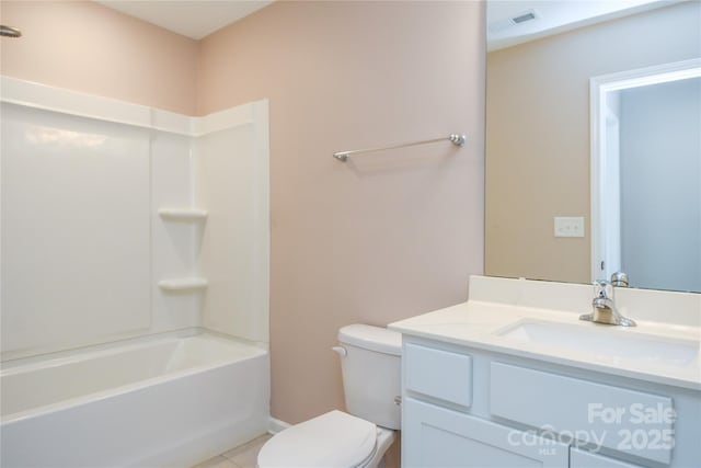 full bathroom featuring tile patterned flooring, vanity, shower / bathtub combination, and toilet