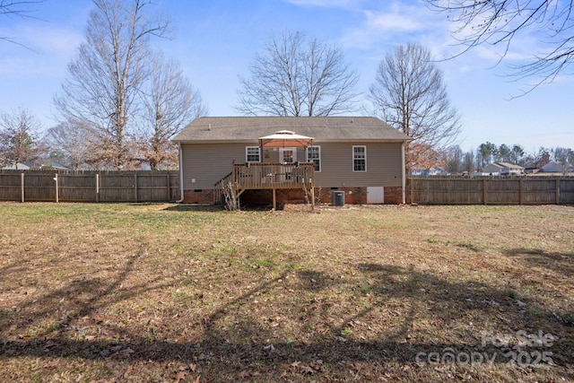 back of house with a wooden deck, a yard, cooling unit, and a gazebo