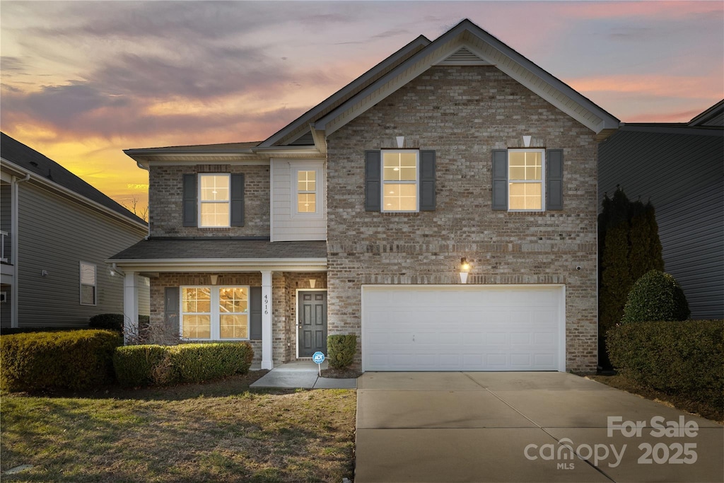 view of front of property featuring a garage