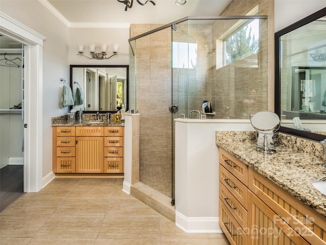 bathroom featuring tile patterned flooring, crown molding, plenty of natural light, and walk in shower