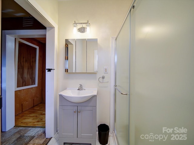 bathroom with vanity and walk in shower