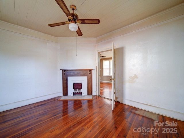 unfurnished living room featuring ceiling fan, ornamental molding, hardwood / wood-style floors, and wooden ceiling