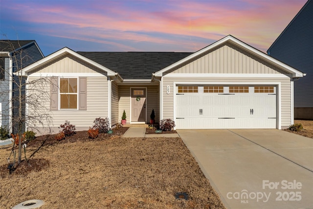 view of front of property featuring a garage