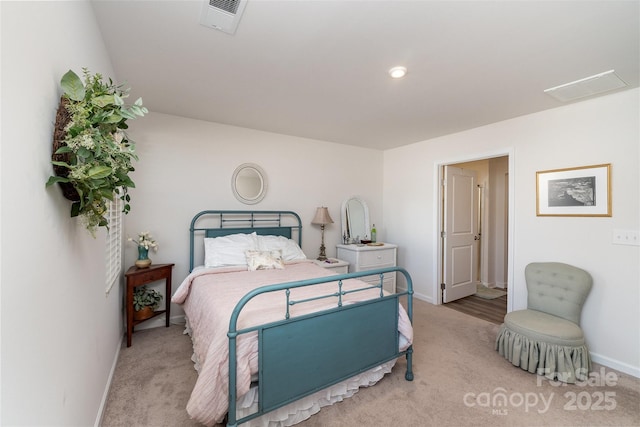 bedroom with light carpet