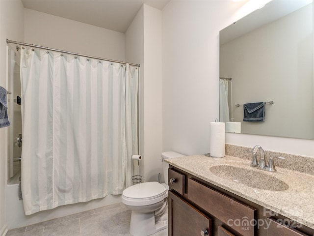 full bathroom with tile patterned floors, vanity, toilet, and shower / tub combo