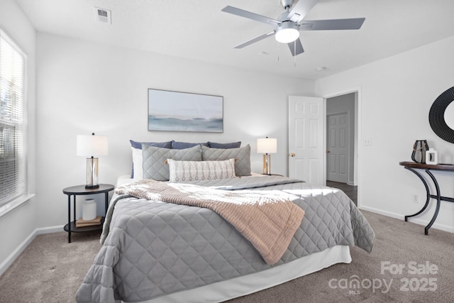 bedroom with ceiling fan and carpet flooring