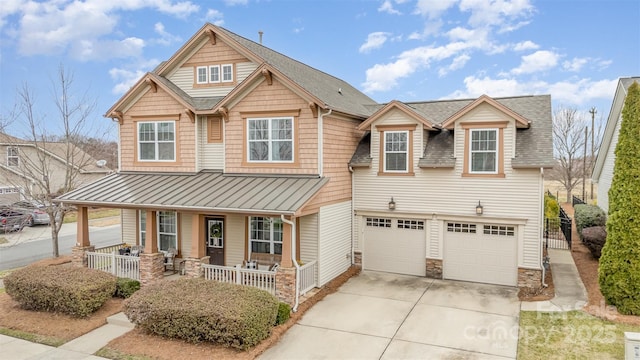 craftsman-style house with a garage and a porch