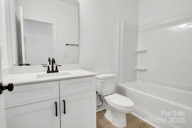 full bathroom featuring shower / bathtub combination, vanity, toilet, and wood-type flooring