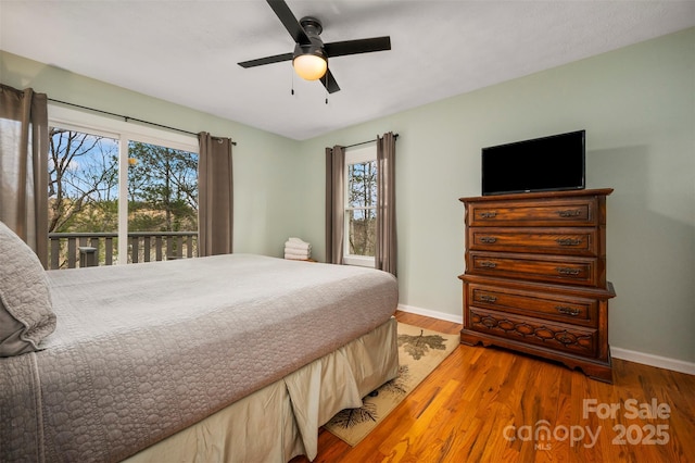 bedroom with hardwood / wood-style flooring and ceiling fan