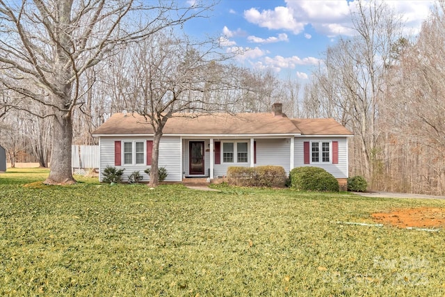 single story home with a front yard