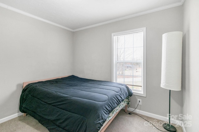 carpeted bedroom featuring ornamental molding