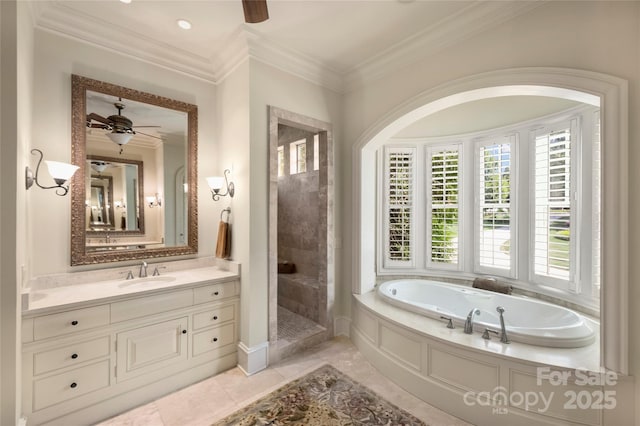 bathroom with tile patterned flooring, vanity, ornamental molding, and independent shower and bath