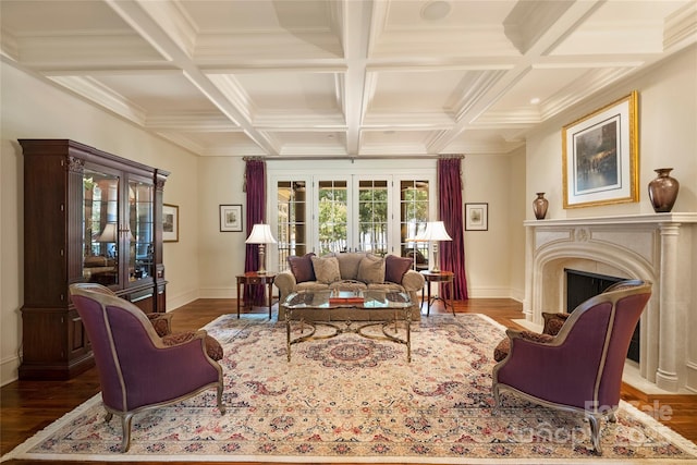 living room with a premium fireplace, wood-type flooring, coffered ceiling, and beam ceiling