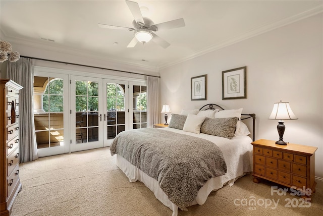 bedroom featuring french doors, light carpet, ornamental molding, ceiling fan, and access to exterior