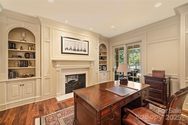 155 Union Chapel Dr, Mooresville, NC 28117 - office featuring built in shelves, dark wood-style floors, a multi sided fireplace, ornamental molding, and recessed lighting