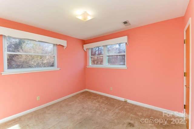 view of carpeted spare room