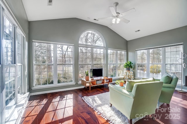 sunroom / solarium featuring ceiling fan and lofted ceiling