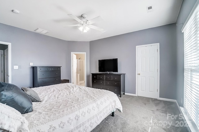 carpeted bedroom with connected bathroom and ceiling fan