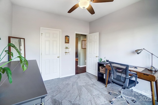 home office featuring ceiling fan and carpet floors