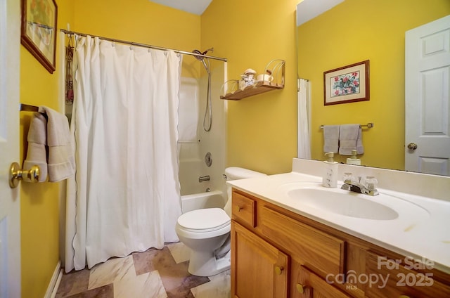 full bathroom featuring vanity, shower / bath combo, and toilet