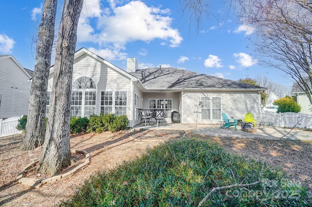 rear view of house with a patio area