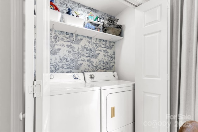 clothes washing area with independent washer and dryer