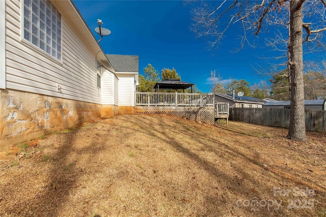 view of yard with a deck