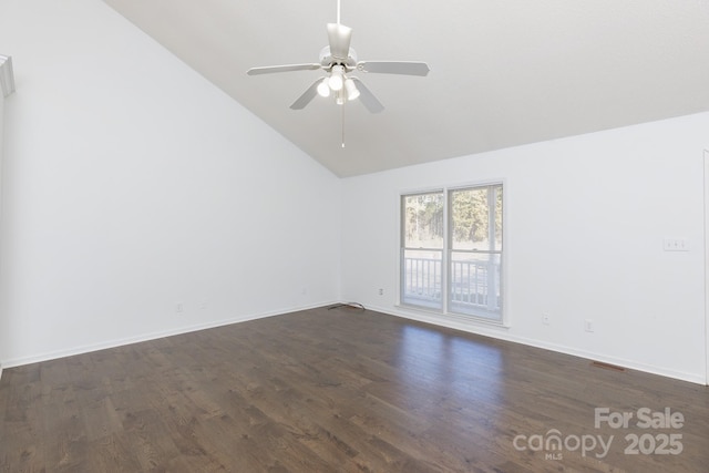 empty room featuring ceiling fan, dark hardwood / wood-style flooring, and high vaulted ceiling