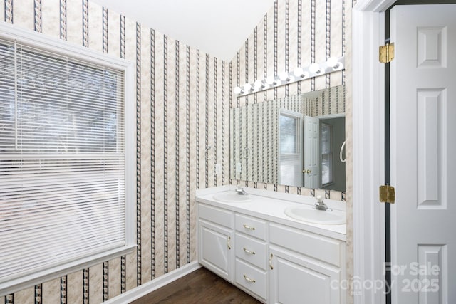 bathroom featuring vanity and hardwood / wood-style flooring