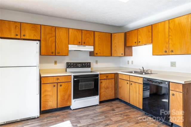 kitchen featuring range with electric cooktop, black dishwasher, sink, dark hardwood / wood-style flooring, and white fridge