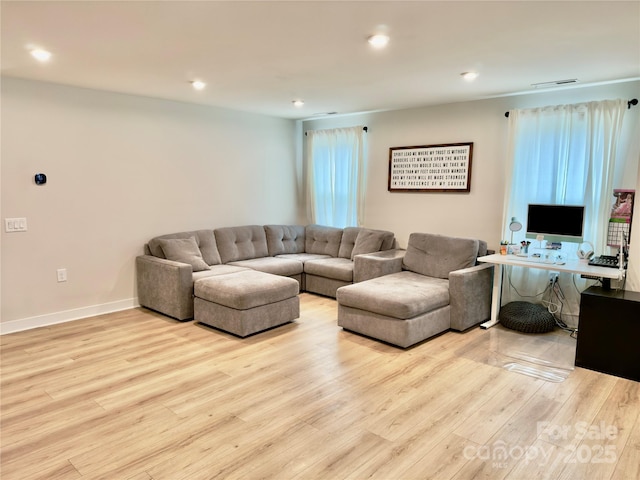 living room featuring light wood-type flooring