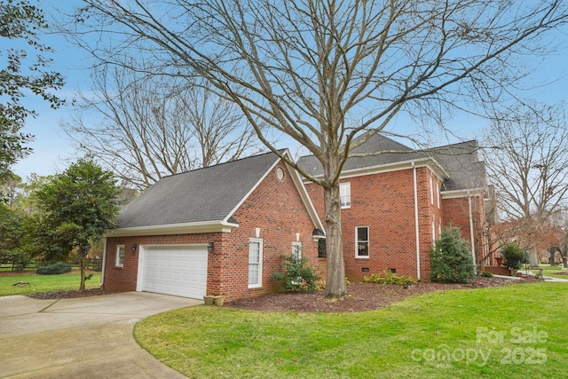 view of side of property with a garage and a lawn