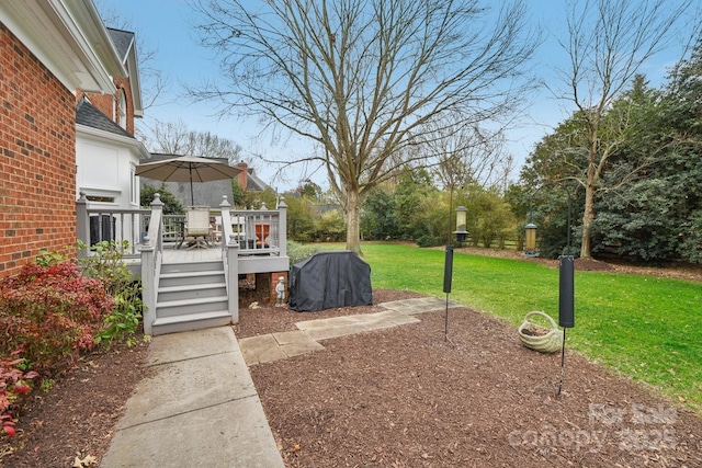 view of yard featuring a deck