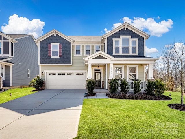 view of front of house featuring a porch, concrete driveway, a front yard, and an attached garage