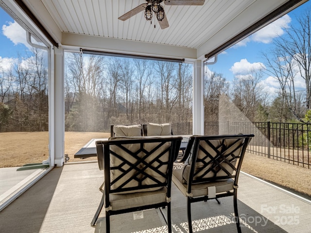 view of patio / terrace featuring a fenced backyard, outdoor lounge area, and a ceiling fan