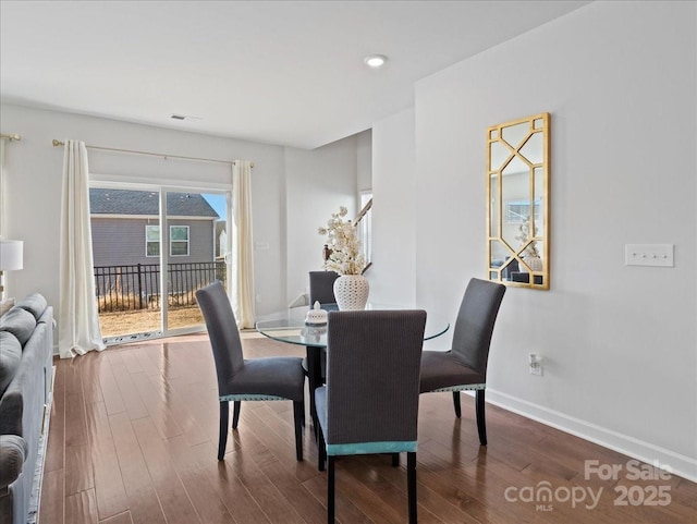 dining room featuring hardwood / wood-style flooring