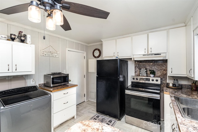 kitchen featuring appliances with stainless steel finishes, washer / clothes dryer, and white cabinets