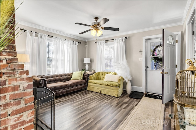 living room with ornamental molding and a healthy amount of sunlight