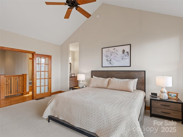 bedroom featuring ceiling fan, light colored carpet, and high vaulted ceiling