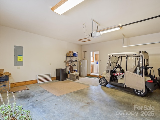 garage with a garage door opener, electric water heater, and electric panel